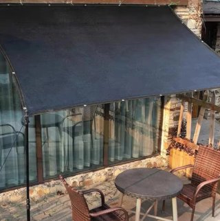 Toldo de 5x2 color negro para exterior.