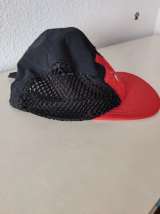 Gorra The North Face Negra y Naranja.