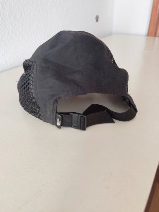 Gorra The North Face Negra y Naranja.