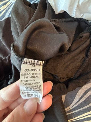 Pantaloni neri gamba larga bottoni oro