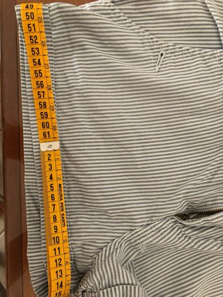 low rise blue and white railroad-striped shorts