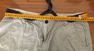 low rise blue and white railroad-striped shorts