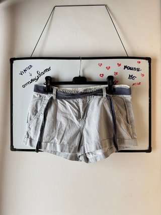low rise blue and white railroad-striped shorts
