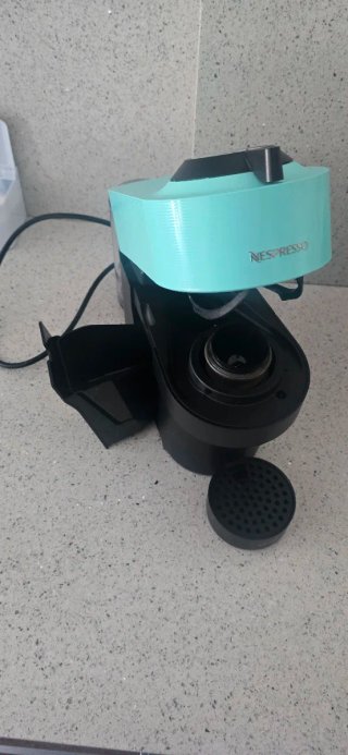 Cafetera Nespresso Krups color turquesa