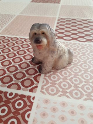 Lote de figuritas: Buda, troll y perros