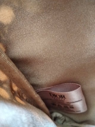 Neceser Dior tejido marrón y dorado