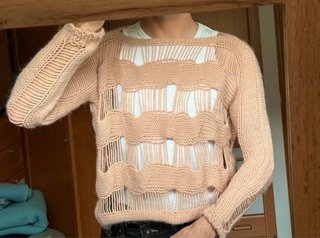 Jersey de punto rosa beige desgastado