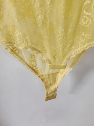 Body in pizzo giallo taglia s