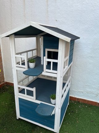 Caseta de madera para gatos exterior jardín