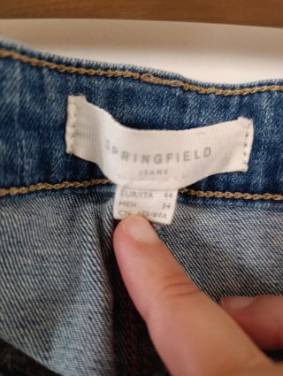 Pantalón vaquero pitillo elástico bordado floral
