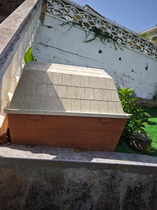 Casa para perro grande de plástico