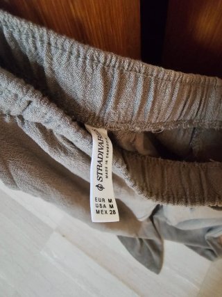 Pantalón lino Stradivarius. Talla M