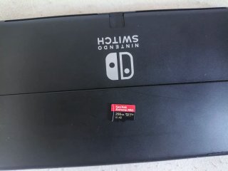 Nintendo Switch OLED original 12 juegos 1 fisico