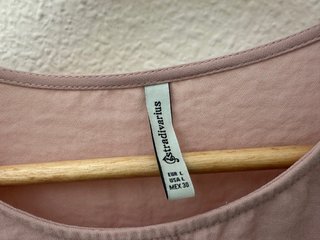Camisa rosa palo manga acampanada