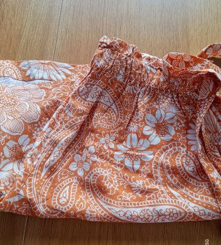 Pantalón corto estampado floral naranja