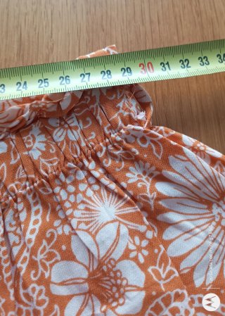 Pantalón corto estampado floral naranja