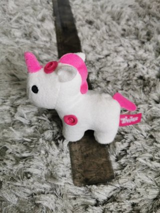Peluche unicornio blanco y rosa