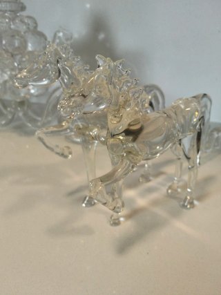 Carrozza di cristallo con cavalli