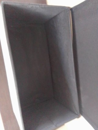 Caja plegable tela y madera.