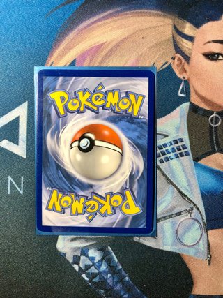 Carta Pokémon Entrenador Handsome idioma español.