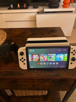 Nintendo Switch OLED Blanca mira las fotos ysabras