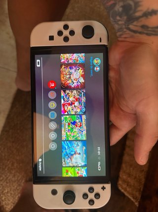 Nintendo Switch OLED Blanca mira las fotos ysabras