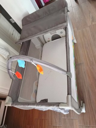 Cuna de viaje y parque infantil
