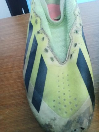 Scarpe da calcio Adidas verdi e nere