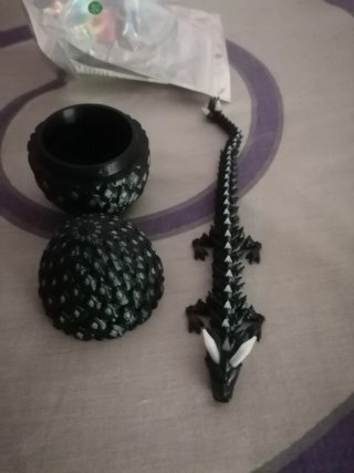 Dragón articulado con huevo 3D
