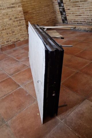 Trampilla escamoteable
