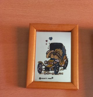 Coppia di specchi con cornice in legno