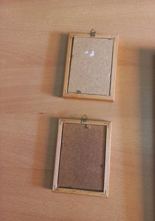 Coppia di specchi con cornice in legno