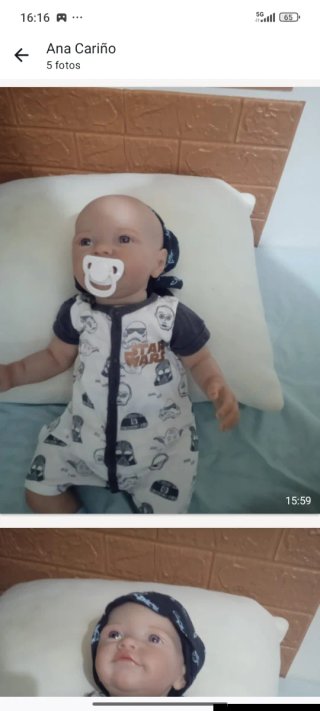 Muñeco bebé realista con chupete