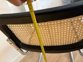 Silla de ratán negra y metal