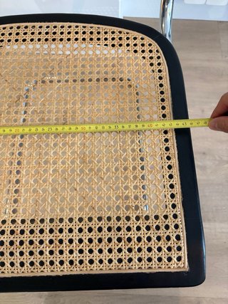 Silla de ratán negra y metal