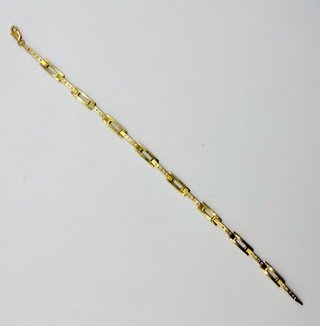 PULSERA BARRAS CON PIEDRAS ORO 18K. Peso 8.54g