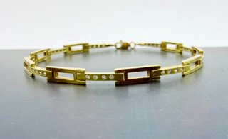 PULSERA BARRAS CON PIEDRAS ORO 18K. Peso 8.54g