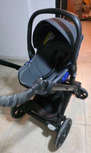 Carro de bebé con silla de coche