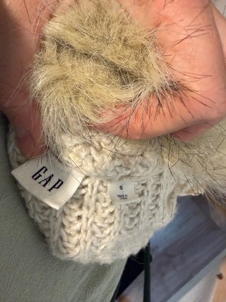 Chaqueta larga beige con cuello de pelo