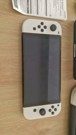 Nintendo Switch OLED + 6 Juegos