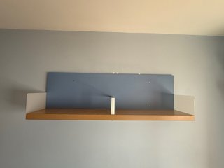Cama nido con estantería