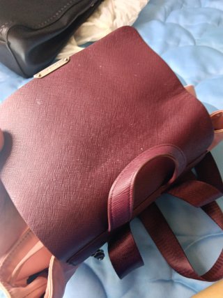 Mochila rosa y morada