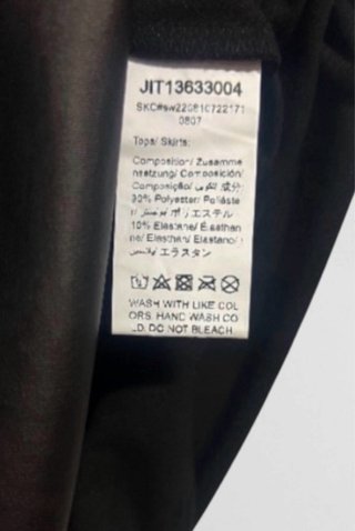 * Talla S. Falda midi negro brillo SHEIN