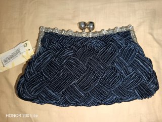 Bolso de fiesta azul tejido