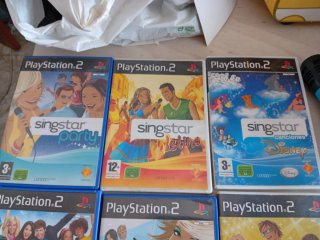 Lote 7 Juegos Singstar PS2 + Micrófonos