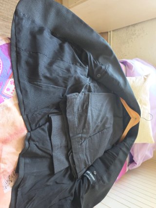 Traje gris de hombre, un solo uso