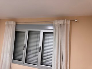 Cortinas visillo y barra metálica