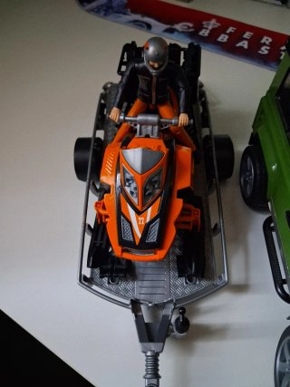 Bruder Defender con Snowmobile e Rimorchio