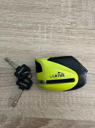 Candado de disco Luma amarillo y negro
