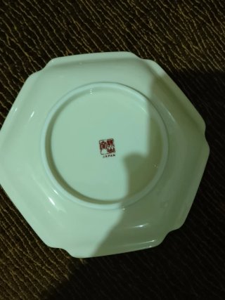 Plato decorativo de porcelana con aves